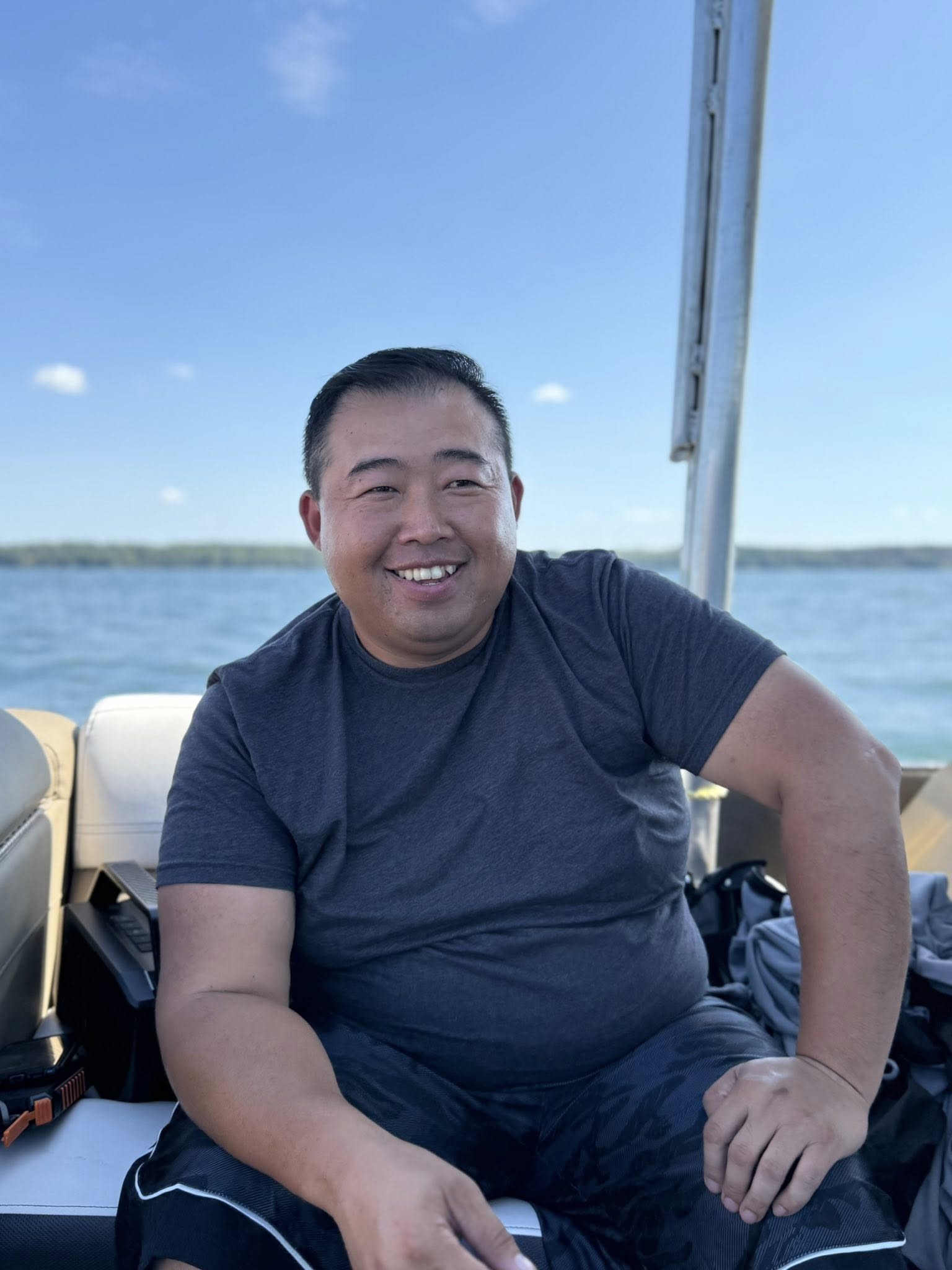 Brother standing on the pontoon