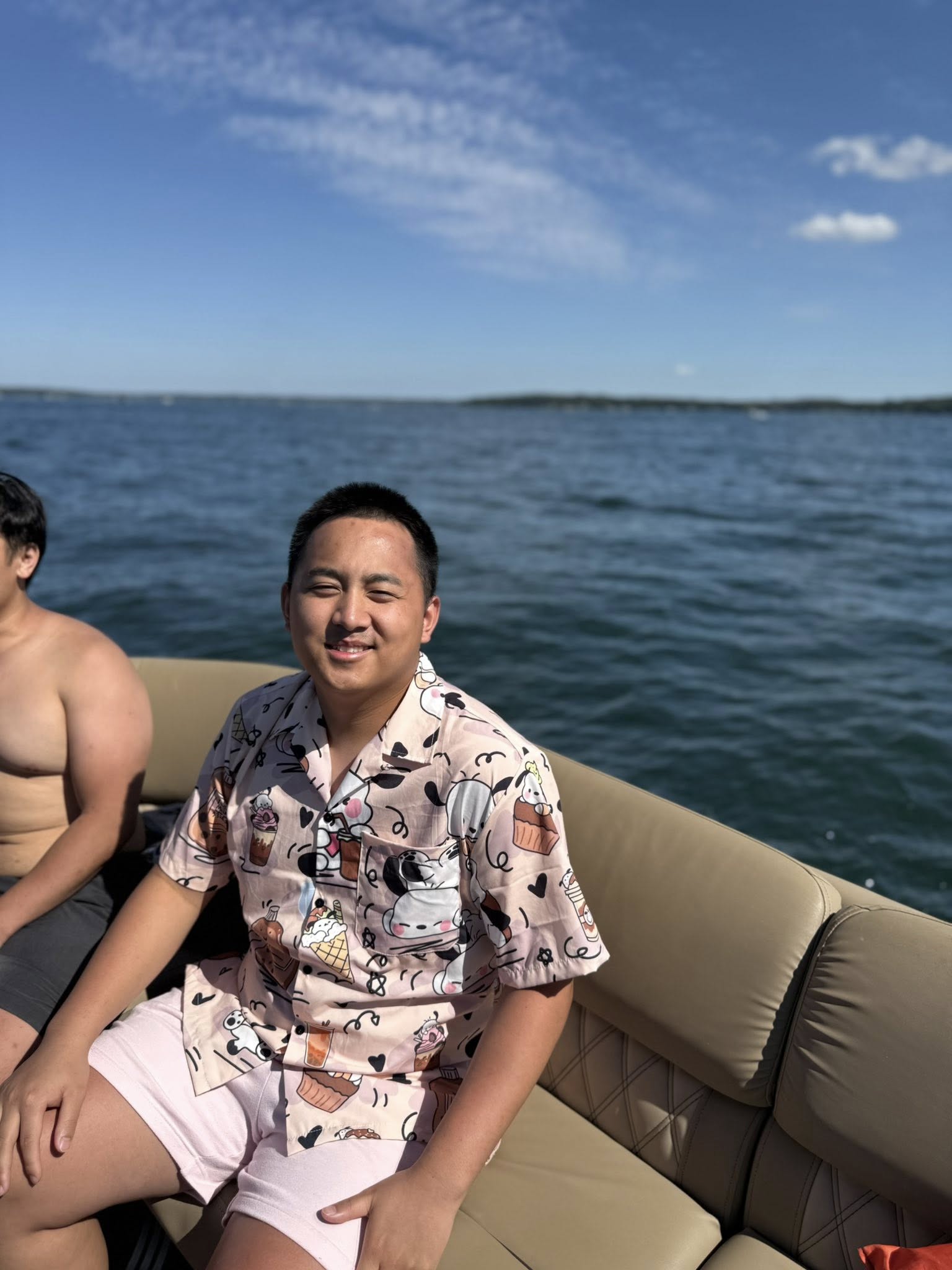 Man steering the pontoon